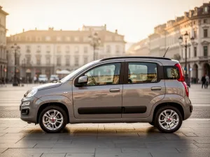 Nowa Dacia Duster zaparkowana na górskim szlaku podczas zachodu słońca, prezentująca nowoczesny design nadwozia.